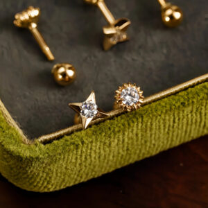 Mismatched CZ Sunburst Star Stud Earrings